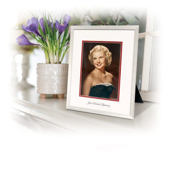 vignette that includes a photo of young blonde woman in picture frame