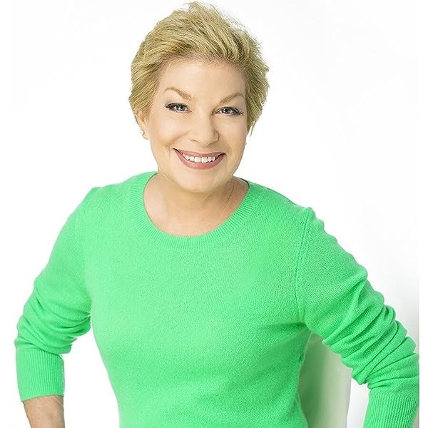 woman with blonde hair wearing green shirt